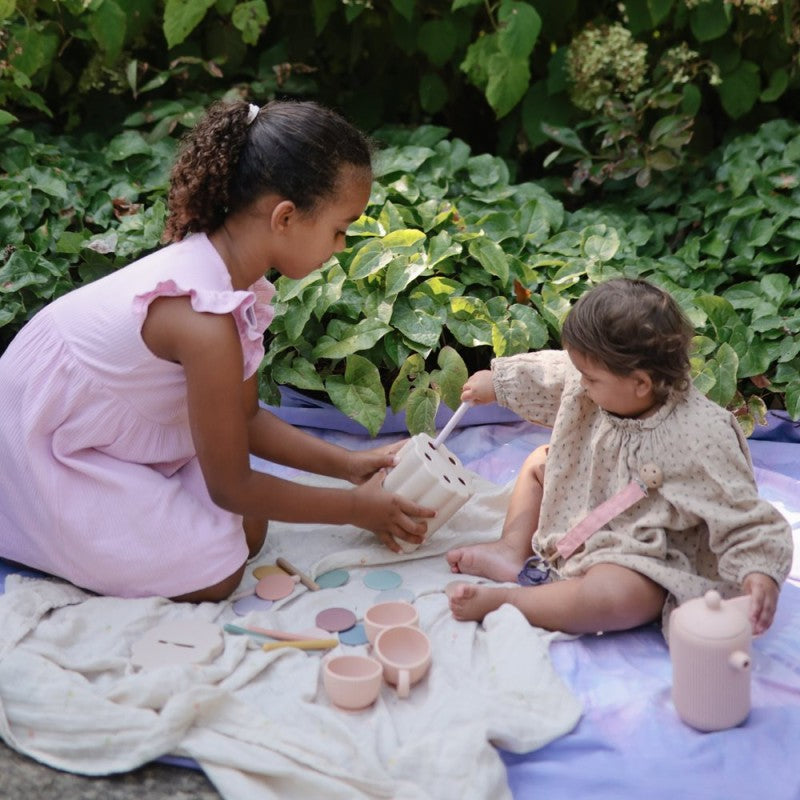 Cubo didáctico tubos/monedas Mushie